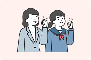 ガッツポーズする生徒と先生